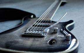 Black six string guitar