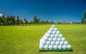 White golf balls on the field