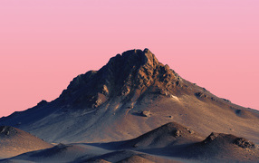 Pink sky over the top of the mountain