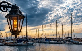 Lantern at the pier at sunset