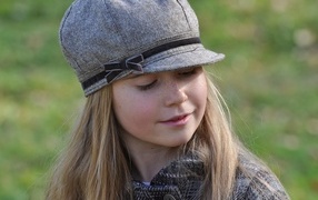 Little girl in a gray cap