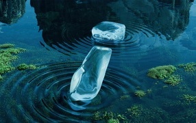 Two piles of ice lie in the water