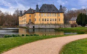 Beautiful castle Dick by the pond, Germany