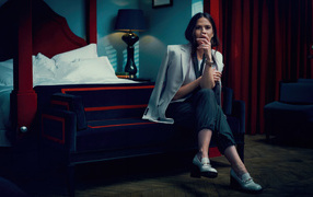 Actress Hayley Atwell sitting on the bed
