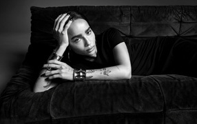 Actress Zoe Kravitz lying on the sofa black and white photo