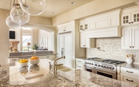 Beautiful white furniture in the kitchen in the house