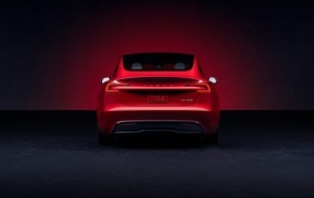 Red 2023 Tesla Model 3 car rear view