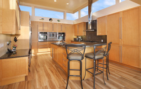 Stylish large kitchen with wooden furniture