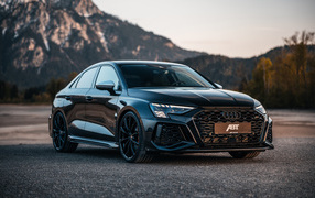 Черный автомобиль  ABT Audi RS 3-S Sedan 2024 года