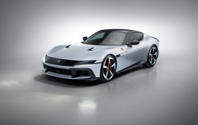 Автомобиль Ferrari 12Cilindri 2024 года на сером фоне