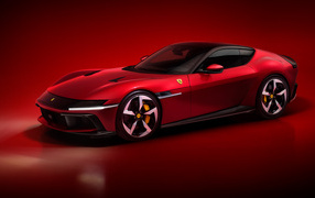 Автомобиль Ferrari 12Cilindri 2024 года на красном фоне