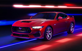 Красный автомобиль Ford Mustang GT Performance 2024 года на черном фоне