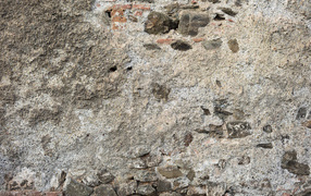 Старая текстурированная стена из цемента и кирпича для фона