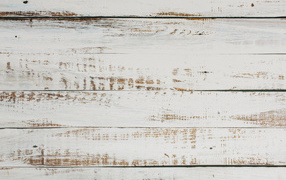 Окрашенная белой краской деревянная поверхность