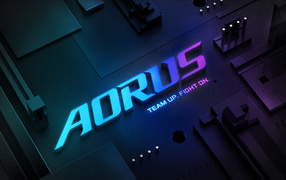 Неоновая надпись aorus gigabyte на железном фоне
