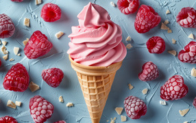 Аппетитный вафельный рожок с мороженым и ягодами малины