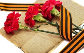 Old letter, carnations and St. George's ribbon for May 9