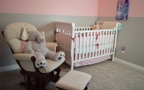 Children's room with bed and chair with toys