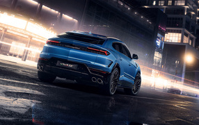 Вид сзади на синий внедорожник Lamborghini Urus SE