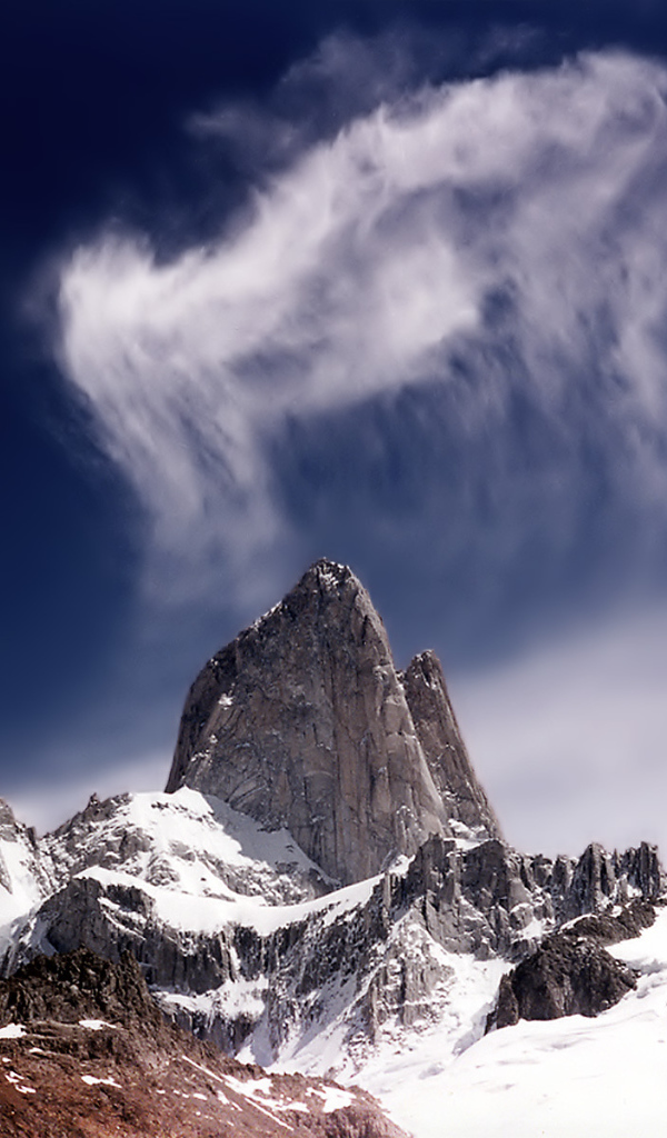 Скала и облака