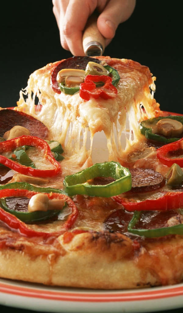 Вкусная горячая пицца