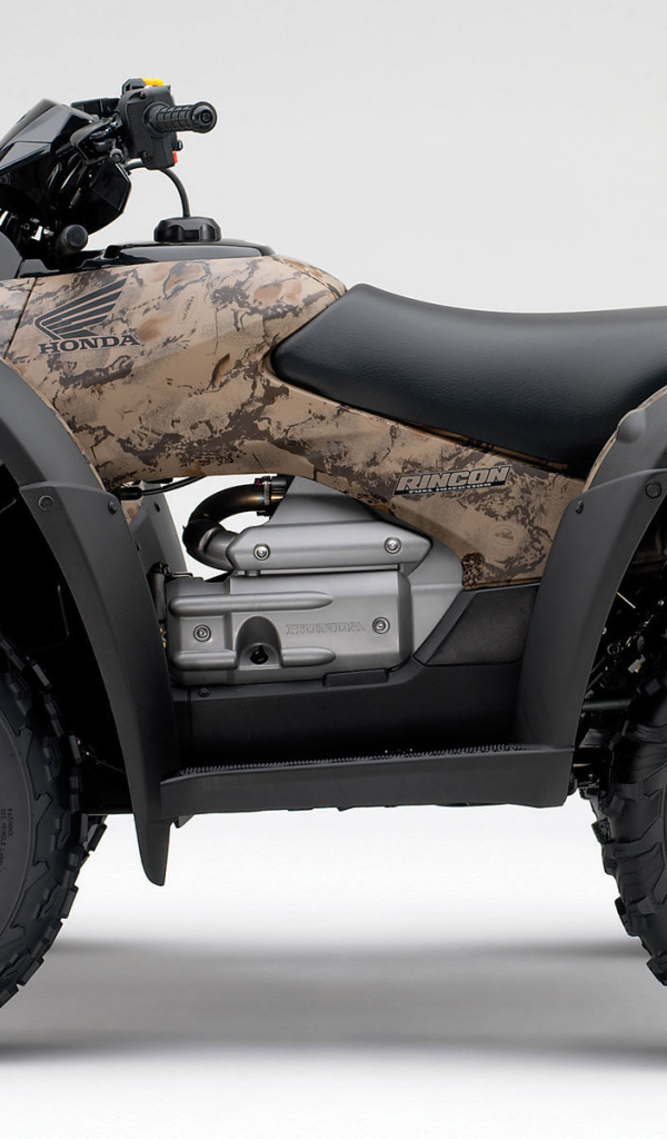 Коричневый Honda квадроцикл