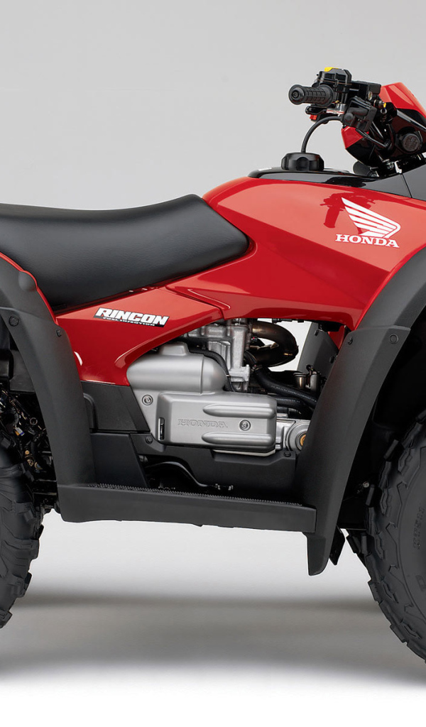 Красный Honda Rincon квадроцикл