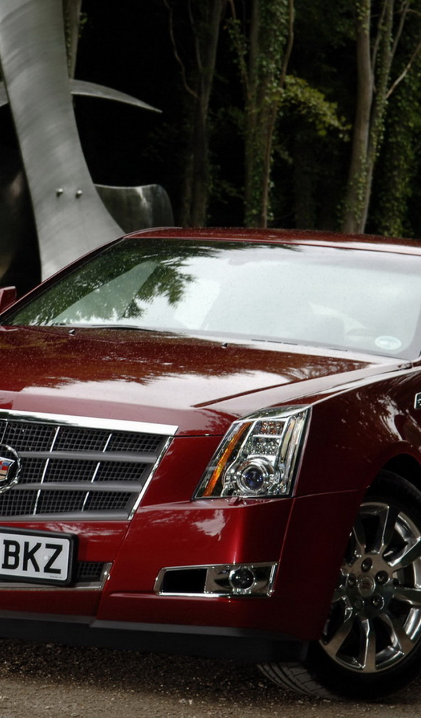 красный Кадиллак CTS