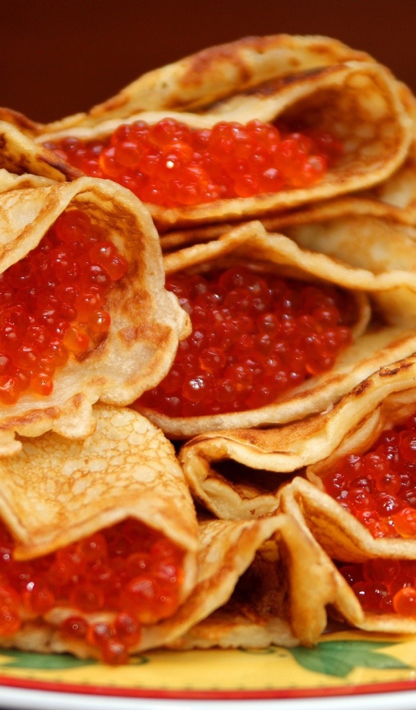 Pancakes with red caviar