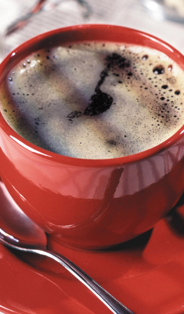Кофе в красной чашке