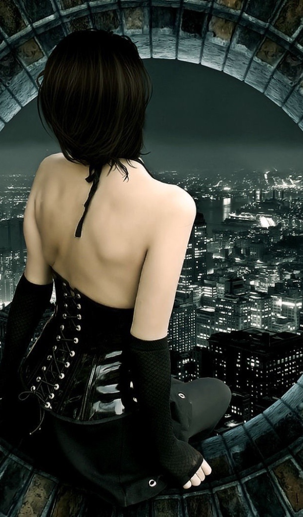 Девушка смотрит на город