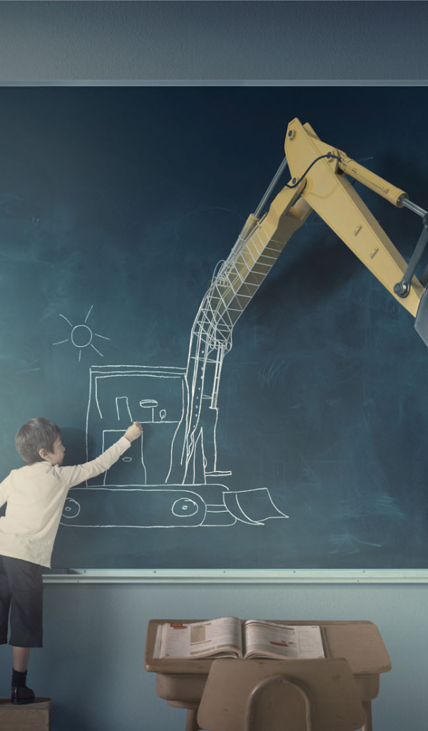 Мальчик рисует экскаватор