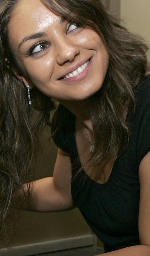 	 Актриса Мила Кунис