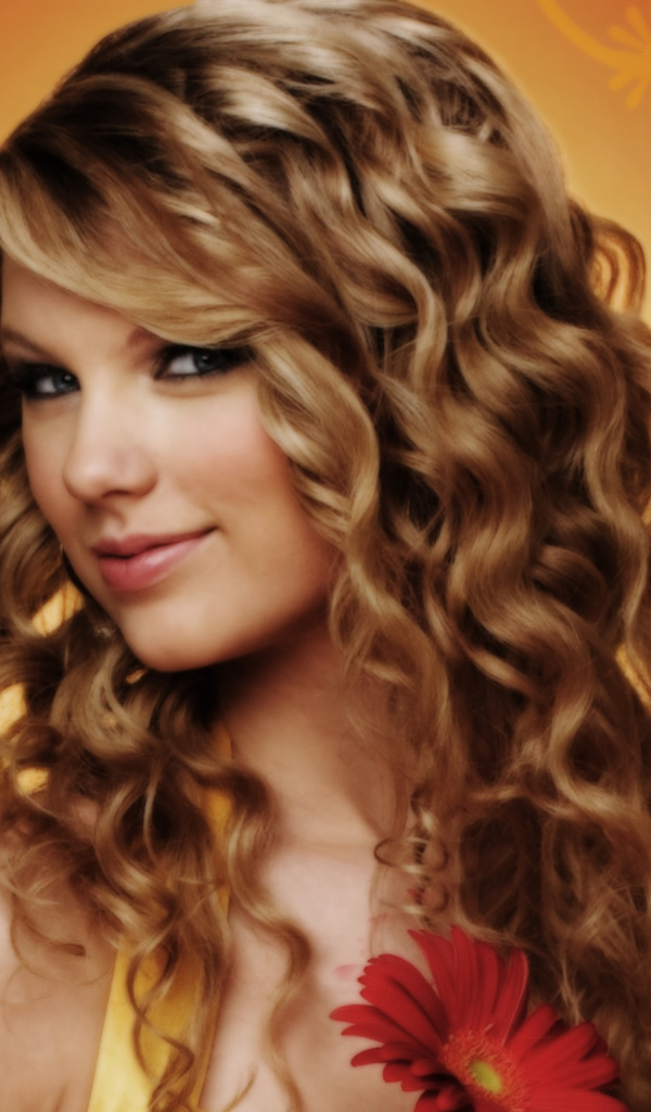 Taylor Swift in orange background