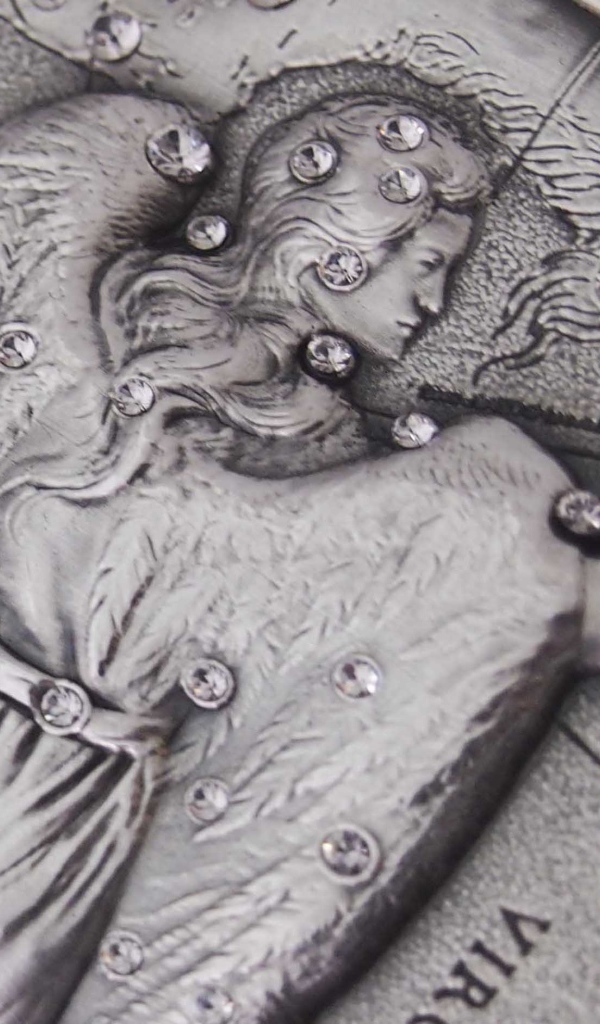 Дева на монете