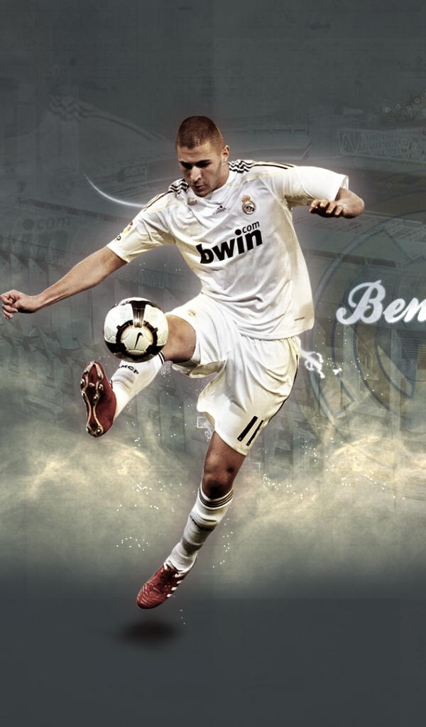 The football player Real Madrid Karim Benzema playing with a ball