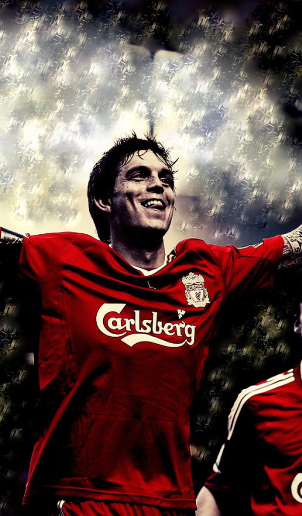 The football player of Liverpool Daniel Agger in dark colors