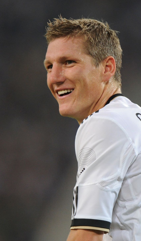 The player of Bayern Bastian Schweinsteiger smiling