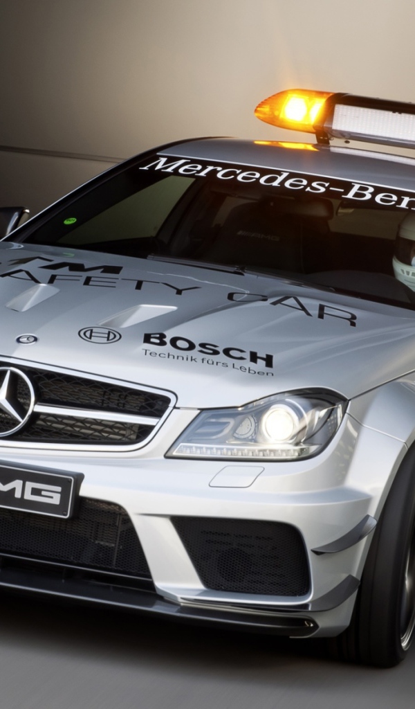 Мерседес с мигалками на крыше