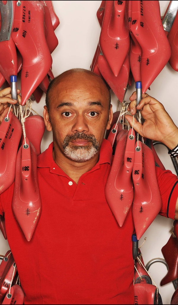 Известный модельер Christian Louboutin