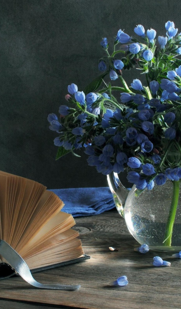 Blue flowers and a book