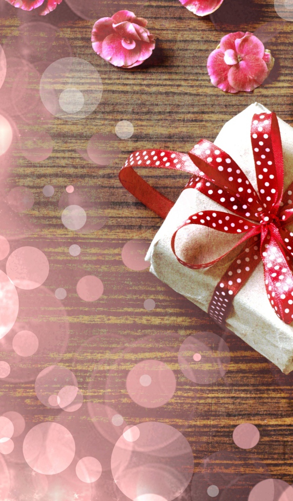 Обвязанный лентой подарок