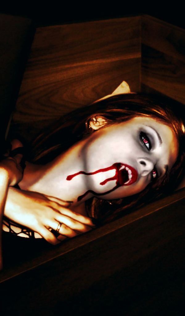 Девушка вампир в гробу