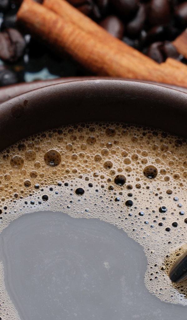 Чашка кофе с корицей