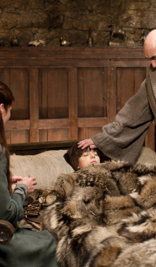 Доктор у больного мальчика