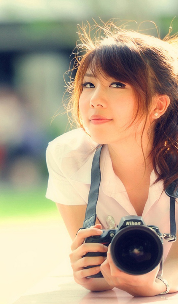 Девушка с фотоаппаратом