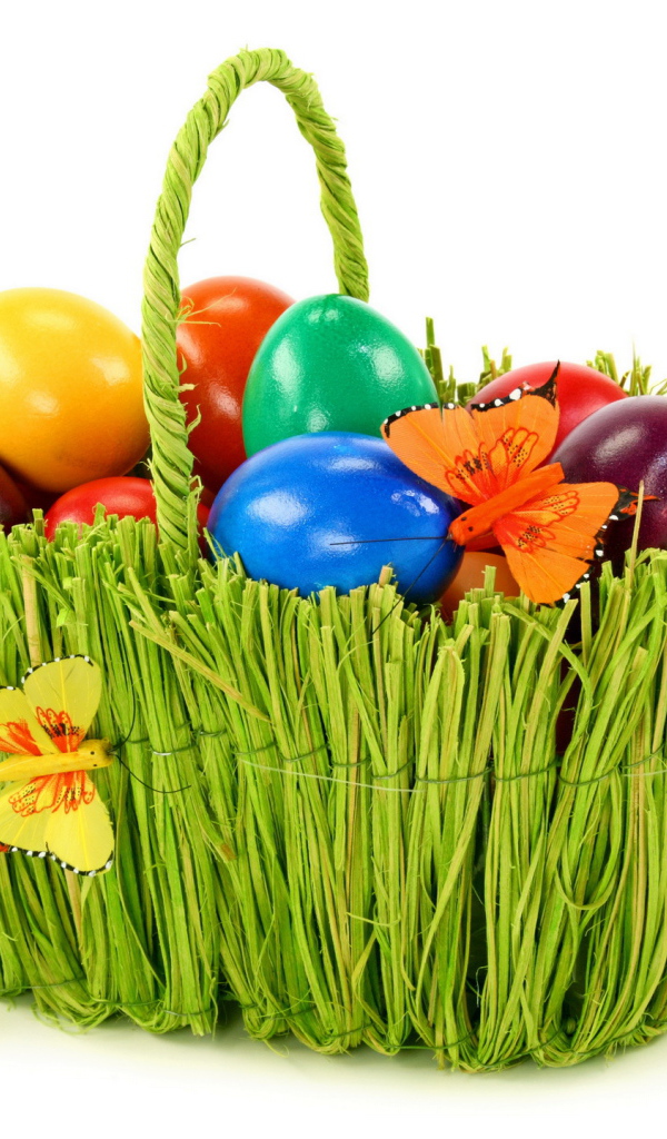 Зеленая корзина с яйцами на Пасху