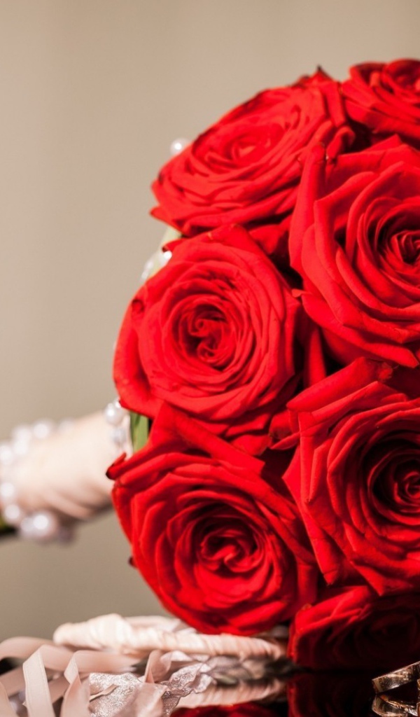 Red roses in a wedding bouquet