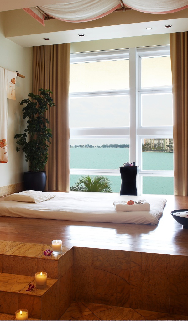 Современная спальня с видом на море