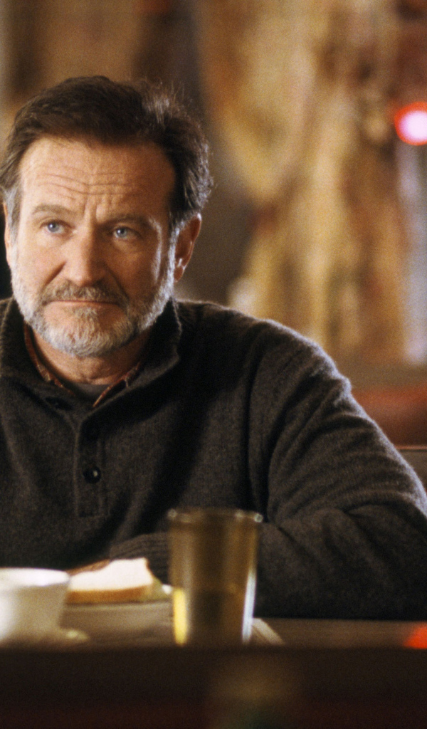 Актер Робин Уильямс за столом